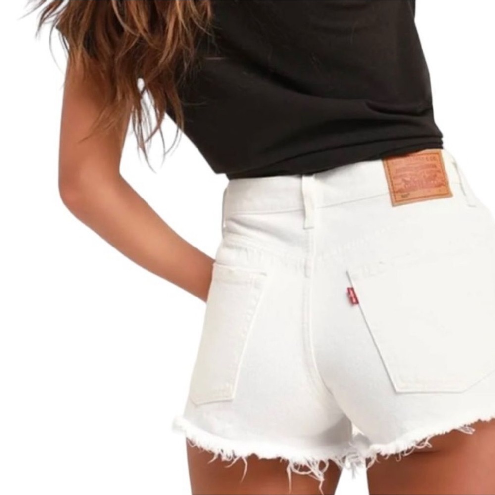 Levi's high-waisted denim shorts, lightly distressed, white